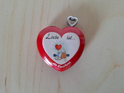 Feuerzeug Herz gas "Liebe ist ein Knockout"